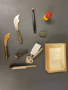 lot 188 image: Vintage Mixed Lot Trench Art tools, USS Concord, Kodak Canister & More Collectibles