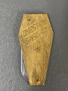 lot 333 image: Vintage Tombstone Casket Co. Novelty Pocket Knife by Taylor Cutlery