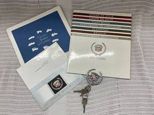 lot 19 image: 1985 Cadillac Brochure Set Keychain Original Keys Dealer Card Elegant Collectible