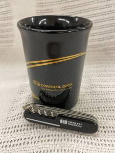 lot 22 image: TAMS Control Data Mug & Hewlett-Packard Multi-Tool by Zwilling J.A. Henckels