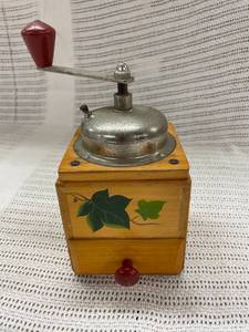 lot 30 image: Vintage Hand-Crank Coffee Grinder Wood Metal with Leaf Motif Rustic Design