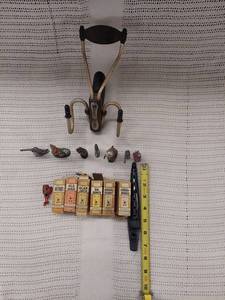 lot 49 image: Vintage Barnett Diablo Slingshot, WWI Metal Soldiers, Russell Card Games & Flute