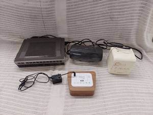 lot 73 image: Lot of 4 Vintage and Modern Alarm Clocks & Clock Radios GE Sony Wood Finish