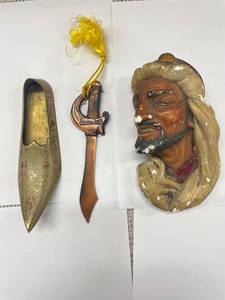 lot 94 image: Decorative Brass Slipper, Copper Dagger, Wall Plaque Set