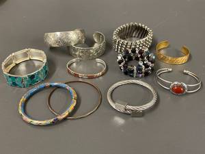 lot 108 image: Set of 11 Mix-and-Match Bracelets in Varied Styles and Materials