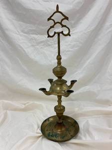 lot 244 image: Vintage Indian Brass Oil Lamp with Ornate Design and Multiple Nozzles
