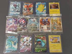 lot 282 image: Lot Of Approximately 13 Pokemon Cards - Many Sealed