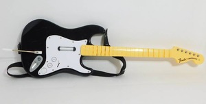 lot 1 image: Nintendo Wii Fender Stratocaster RockBand Guitar Harmonix