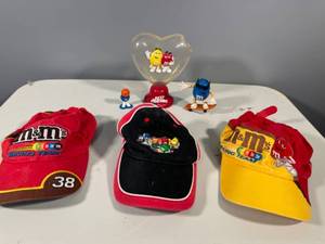 lot 14 image: Lot of 3 M&Ms Racing Team Caps and M&Ms Figurines