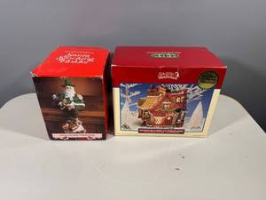 lot 37 image: Set of 2 Christmas Decorative Pieces Irish Father Christmas Figurine & Santas Wonderland Lighted House