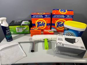 lot 45 image: Lot of Household Cleaning Supplies including Tide, OxiClean, Bounce, and Face Masks