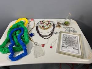lot 50 image: Assorted Jewelry Lot with Necklaces, Heart Jewelry Box, and Picture Frame