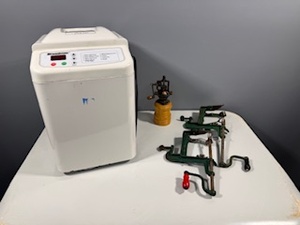 lot 113 image: Breadman Automatic Bread Maker Model TR-440 with Mixers and Attachments and Two Apple Peelers