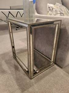 lot 67 image: A pair of Uttermost Julie Mirrored End Table in Burnished Antique Gold and Mottled Antique Mirror. 22 x 24 inch each.