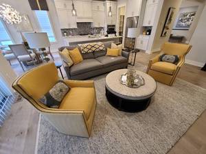 lot 2 image: A pair of Wesley Halls Luna Swivel Armchairs