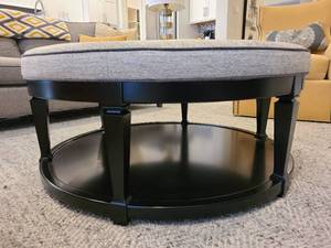 lot 3 image: Round Coffee Table - Ottoman. by Studio M.