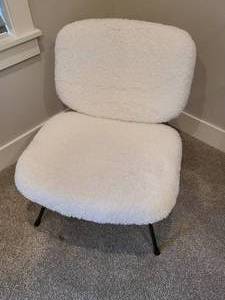 lot 47 image: Astor Faux-Fur Accent Chair by Four Hands Furniture.