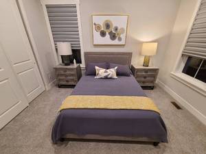 lot 48 image: Queen size bed with all bedding shown.  Blankets, Mattress, pillows etc.