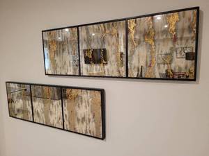 lot 84 image: A Pair of Marbleized Mirrors by Uttermost.