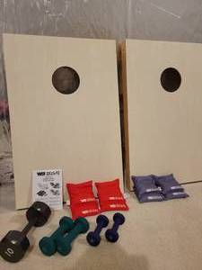lot 89 image: Wild Sports Cornhole Bean Bag Toss Game,  Dumbbell Weights.