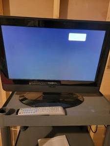 lot 92 image: Insignia 20 LCD TVDVD Combo with Remote and Manual.