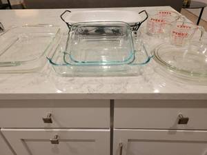 lot 100 image: Lot of Pyrex Roasters, Measuring Cups, Pie Dishes etc. Corning Roaster with holder.