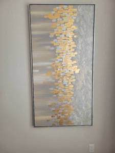 lot 106 image: A large 61 x 31 artwork by Uttermost. Silver & Gold raised rectangles on gray-silver modern background.