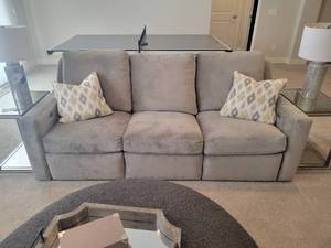 lot 107 image: A Dual Reclining Sofa by KFI-Comfort Design.