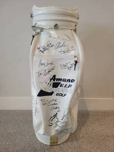 lot 109 image: Dozens of Autographs. Golf Bag. Tom Watson, Naomi Judd, Tom Byrum, Ernest Borgnine, Wynonna Judd, Oak Ridge Boys many others.