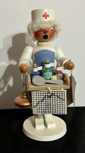 lot 108 image: Vintage Holzkunst Christian Ulbricht Nurse Figurine Smoker