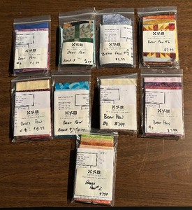 lot 189 image: Nine New Quilt Cove Bears Paw Quilting Kits