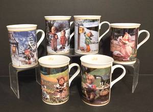 lot 209 image: Set of Six Danbury Mint Hummel Mugs