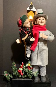 lot 61 image: Vintage Holiday Creations Tiny Tim and Scrooge Animated Lamp Post Scene