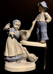 lot 65 image: Two Large Vintage Blue and White Holland Mold Boy with Goose and Girl with Geese