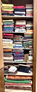 lot 168 image: Attention Quilters Closet Full of Fabric in a Variety of Themes, Colors and Sizes