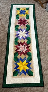 lot 255 image: Blooming StarsJean Korupps Challenge Quilted Decor by Stella Marie