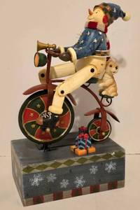 lot 289 image: Joy to the World Wooden Snowman on Bicycle