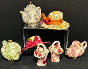 lot 143 image: Miniature Porcelain Teapots, Decorative Sun Hats, and More