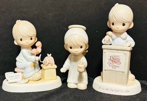 lot 159 image: Three Precious Moments Collectibles including The First Noel and More