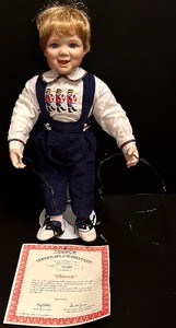 lot 326 image: New Ashton Drake Patrick Decorating The Tree
