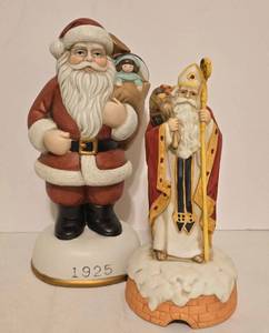 lot 426 image: Enesco Musical Father Christmas Figure and Flambro Musical Santa Claus Figure