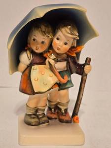 lot 495 image: Rare Hummel Figurine Stormy Weather