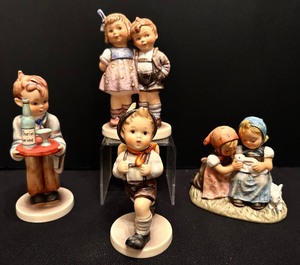 lot 517 image: Hummel Collectables The Waiter, School Boy,  Easter Time and More