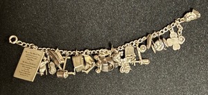 lot 527 image: Charming Charm Bracelet including Several Sterling Silver Charms