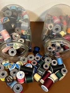 lot 551 image: Two Large Jars of Sewing Thread in Many Colors