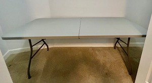 lot 77 image: Six Foot Foldable Table with Handles