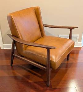 lot 5 image: Jollen Winged Leather Armchair