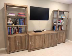 lot 23 image: Aspenhome Paxton Three Piece Credenza and Bookshelves Set