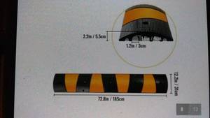 lot 87 image: Pair of Rubber Speed Bumps with Yellow Stripes