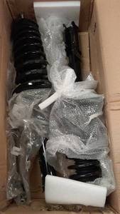 lot 89 image: Complete Strut Assembly Kit with Installation Instructions